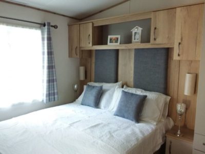 double bed bedroom in caravan holiday home