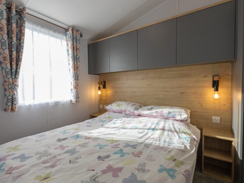 Main bedroom in caravan holiday home